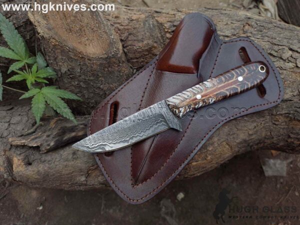 Full tang Damascus Cowboy Knife with genuine cowhide leather pancake sheath.