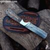 Bull cutter knife with sheath.