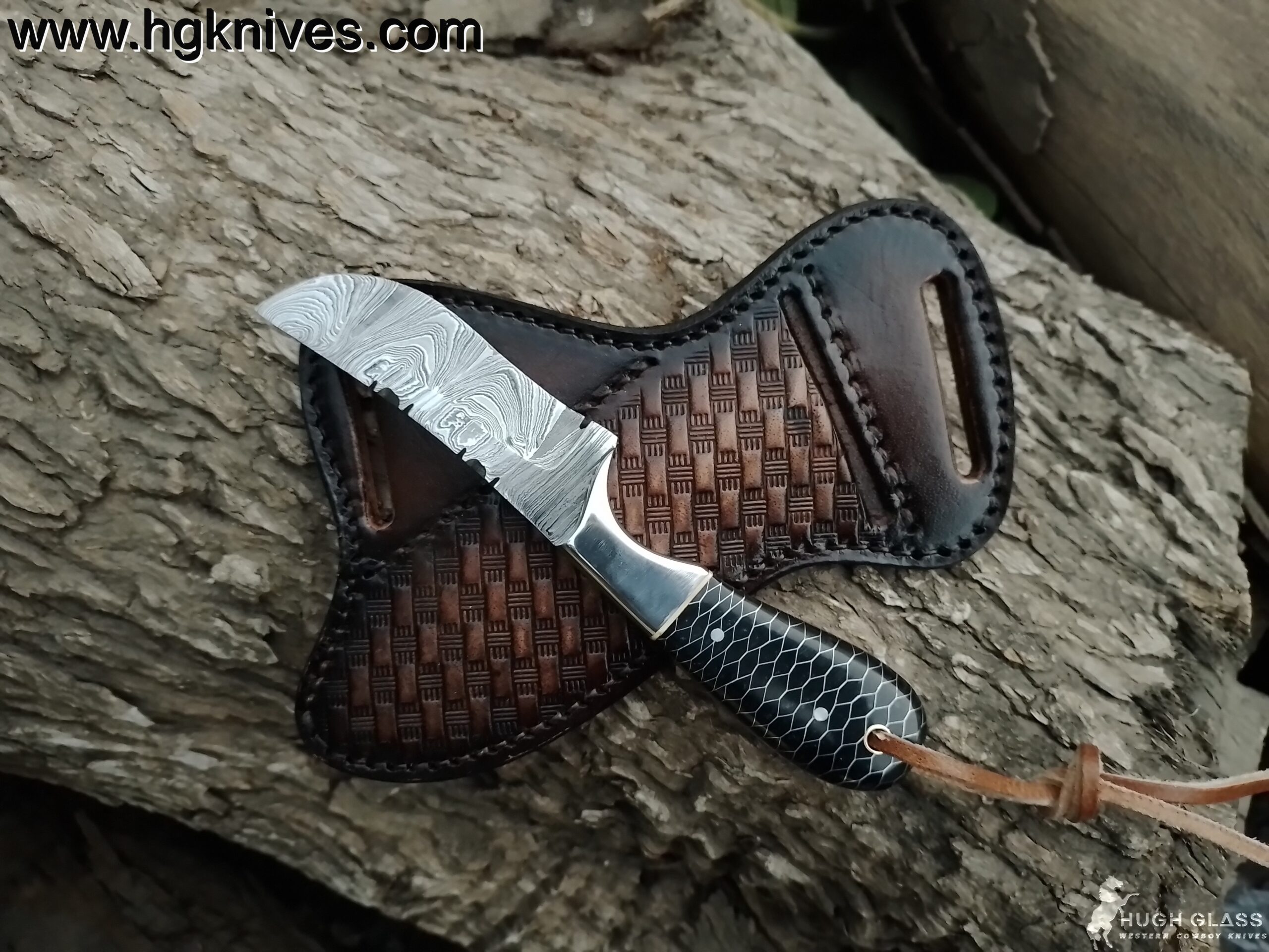 Full tang Cowboy knife handle showing the honeycomb grip texture and polished stainless steel bolsters.