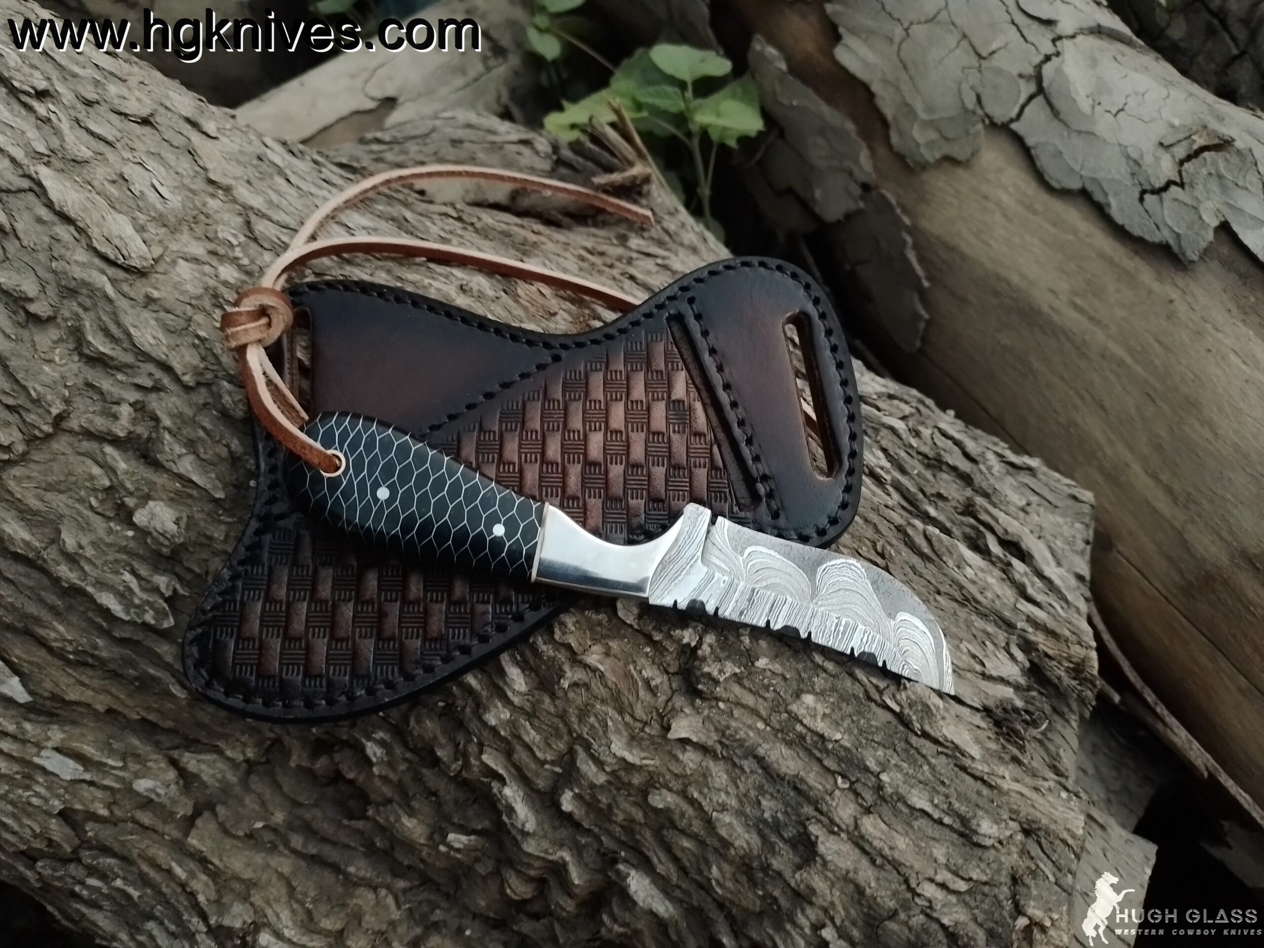 Custom Hand Forged Damascus Cowboy Knife with 4-inch drop point blade, honeycomb handle, and brown leather Pancake knife sheath.